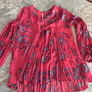 Free People Tunic with embroidery detail on the front and on the arms.